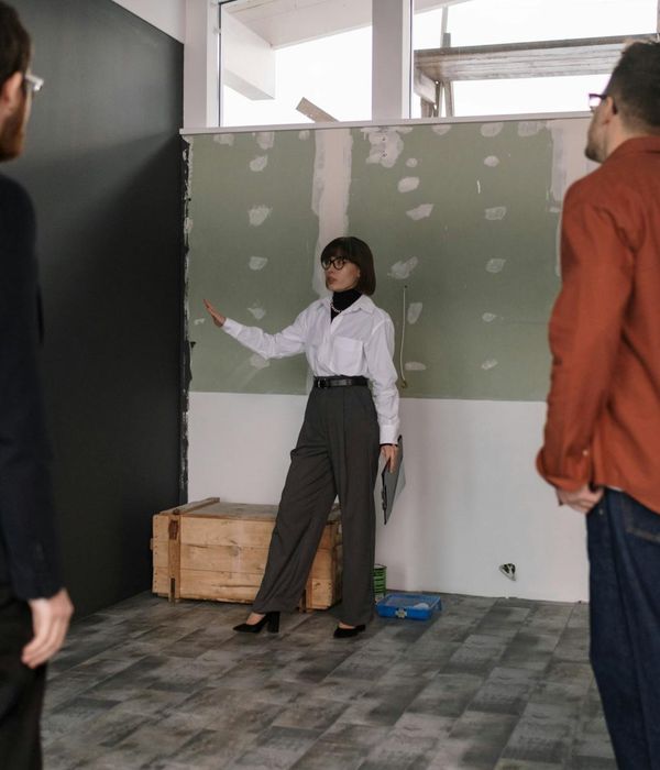 Professional team planning renovation strategy